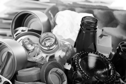 Operative preparing for flat clearance in Harrow with protective equipment